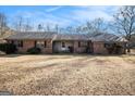 Ranch style brick home with a spacious lawn at 255 Barnett Road Rd, Hampton, GA 30228