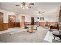 Living Room with a fireplace and ceiling fan at 255 Barnett Road Rd, Hampton, GA 30228