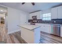 Modern kitchen with granite island and stainless steel appliances at 1198 E Atlanta Rd, Stockbridge, GA 30281