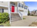 Wooden steps leading to the front entrance of the home at 119 Bombay Ln, Grantville, GA 30220