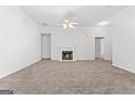 Spacious living room with carpet and fireplace at 10231 Deep Creek Pl, Union City, GA 30291