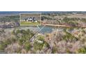 Aerial view of the property showing acreage and lake access at 459 Lester Rd, Fayetteville, GA 30215
