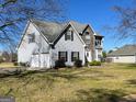 Inviting two-story home with a two-car garage, situated on a well-maintained lawn at 825 Karie Dr, Mcdonough, GA 30253