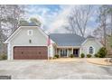Well maintained single Gathering home with a two car garage and neutral paint at 3030 Shallowford Park Mnr, Roswell, GA 30075