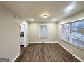 Inviting dining area with new laminate floors, ample natural light, and convenient access to the kitchen at 2634 Rockcliff Se Rd, Atlanta, GA 30316