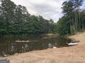 Scenic view of the pond with direct access from the property at 8470B Wallace Tatum Rd, Cumming, GA 30028