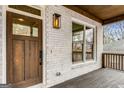 Charming front door and light fixture at 1055 Ormewood Se Ave, Atlanta, GA 30316