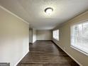 Spacious living room featuring hardwood floors and ample natural light at 4568 Dorset Cir, Decatur, GA 30035