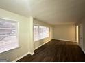Spacious living room with beautiful hardwood floors and ample natural light at 191 Florida Sw Ave, Atlanta, GA 30310