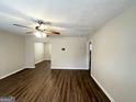 Inviting living room featuring modern flooring and neutral paint, creating a cozy atmosphere at 1756 Lynn Ln, Decatur, GA 30032