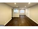 Bright living room featuring newly refinished hardwood floors and fresh paint at 2819 Gresham Rd, Atlanta, GA 30316