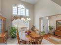 Inviting dining area with natural light, chandelier, and ample space for entertaining at 506 Olivia Ct, Stockbridge, GA 30281