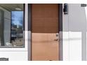 Close up of the front door with a digital lock and modern design at 567 Middle Sw St, Atlanta, GA 30310