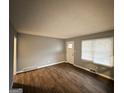Inviting living room with wood floors, ample natural light, and neutral walls at 1779 Rosewood Rd, Decatur, GA 30032