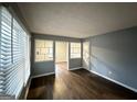 Bright living room featuring wood floors and neutral paint colors at 1779 Rosewood Rd, Decatur, GA 30032
