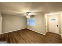 Inviting living room with wood floors, neutral paint, and a ceiling fan at 3696 Aldea Dr, Decatur, GA 30032