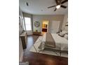 Sunlit bedroom with modern furnishings, wood floors and en suite bathroom access at 870 Nw Mayson Turner Nw Rd # 1227, Atlanta, GA 30314