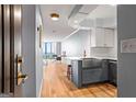 This condo has an adorable kitchenette with updated appliances, a farm-style sink, and a pass-through to the living area at 2870 Pharr Nw Ct # 2008, Atlanta, GA 30305