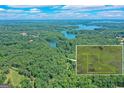 Beautiful aerial view of 34 acre lot featuring shoreline on Lake Lanier at 5200A Burruss Mill Rd, Cumming, GA 30041
