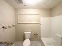 Cozy bathroom with new fixtures, including a tiled shower and modern toilet at 2310 Ousley Ct, Decatur, GA 30032