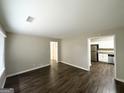 Spacious living room with hardwood floors offering seamless transitions to other living spaces at 2310 Ousley Ct, Decatur, GA 30032