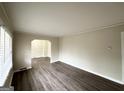 Bright living room featuring sleek floors and neutral paint, creating a modern and inviting space at 2030 Mark Trl, Decatur, GA 30032