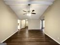 Open floor plan features wood floors, ceiling fan and neutral paint at 246 Bridgewood Se Dr, Conyers, GA 30094