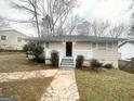 Cozy home with a well-kept front yard and quaint entrance, perfect for a relaxing retreat at 2922 Dale Pl, Decatur, GA 30032