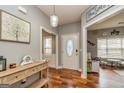 Inviting entryway with hardwood floors, stylish decor, and ample natural light at 270 Sturgess Run, Sharpsburg, GA 30277