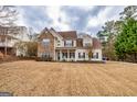 Charming two-story home with stone accents, inviting front porch, and well-maintained lawn at 270 Sturgess Run, Sharpsburg, GA 30277