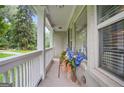 Inviting covered front porch featuring white columns, offering a charming outdoor space at 1273 Boulevard Lorraine Sw, Atlanta, GA 30311