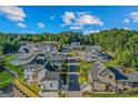A neighborhood aerial view of luxury homes at 930 Laurel Brooke Ave, Peachtree City, GA 30269