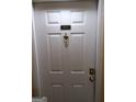 Apartment door with the unit number 4111, door knocker, and keypad lock at 4111 Pine Heights Ne Dr, Atlanta, GA 30324