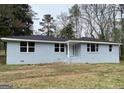 Single story home with recent paint and updated windows at 47 Elm St, Hampton, GA 30228
