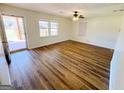 Cozy living room with door leading to a porch and wood-look floors at 36 Reese St, Grantville, GA 30220