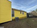 Home exterior with a backyard and sky view at 3796 Saddle Ridge Dr, Snellville, GA 30039