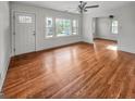 Inviting living area boasts refinished hardwood floors and recessed lighting at 2117 Keheley Dr, Decatur, GA 30032