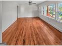 Bright living room featuring gleaming hardwood floors and an abundance of natural light at 2117 Keheley Dr, Decatur, GA 30032
