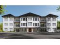 Charming condo complex showcases a stylish facade, private balconies, and mature trees at 1000 Blair Ln # 302, Peachtree City, GA 30269