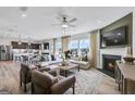 Spacious living room featuring a fireplace, plush seating, and open concept design at 120 Aj Welch Jr Way, Mcdonough, GA 30252