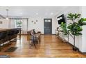 Bright living space with hardwood floors, comfortable seating, and a view of the outdoors at 3044 Sunset Ln, East Point, GA 30344