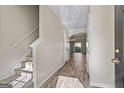 Inviting foyer with hardwood floors, stairs, and natural light at 3815 Pleasant Oaks Dr, Lawrenceville, GA 30044