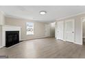 Bright living room with a fireplace and neutral walls at 309 Coral Cir, Mcdonough, GA 30253