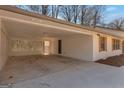 Spacious carport featuring unique lattice wall at 2598 Lake Shore, College Park, GA 30337