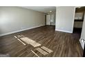 Spacious living room featuring modern hardwood floors and neutral wall paint at 2804 Mitchell Dr, Decatur, GA 30032