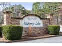 Stone sign welcomes residents to Hickory Lake community at 391 Hickory Lake Dr, Acworth, GA 30101