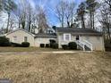 Charming home with a front lawn and well-maintained landscaping at 2430 Fern Valley Ct, East Point, GA 30344