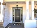 Close-up of a charming front door with decorative details and a welcoming entrance at 34 Brittany Way, Palmetto, GA 30268