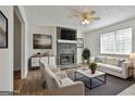 Inviting living room with stone fireplace and neutral decor at 5938 Rock Ct, Union City, GA 30291