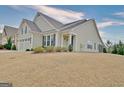 Charming single-Gathering home with a two-car garage, well-manicured lawn, and inviting curb appeal at 339 Cottonwood Cir, Peachtree City, GA 30269